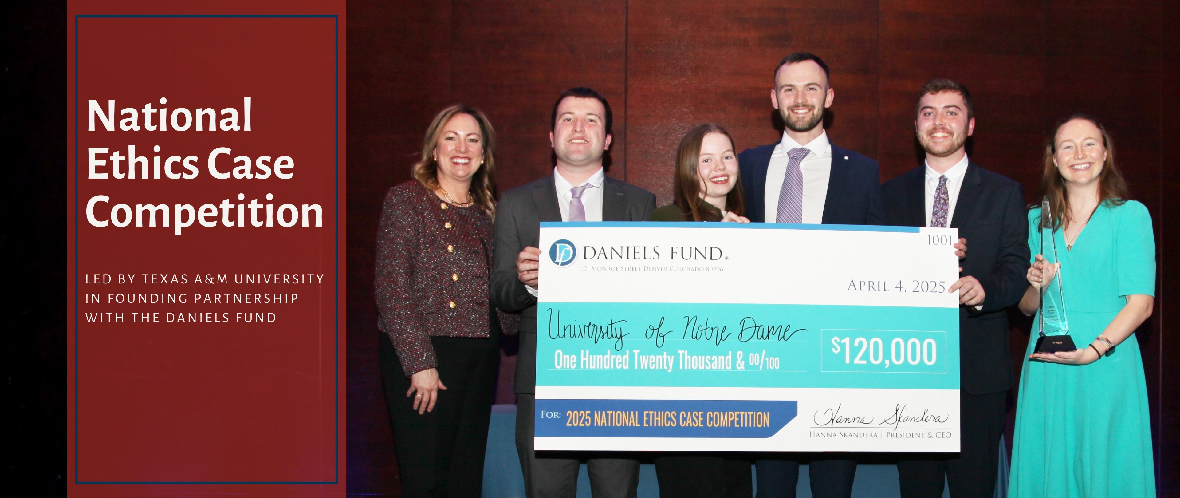 Photo of the 2025 winning team from University of Notre Dame holding oversized check for $120,000 with Hanna Skandera, President and CEO of Daniels Fund.